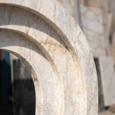 Calacatta Gold Polished Arched Marble Fireplace Surround — marble detail