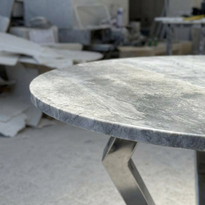 Carrara Marble Round Table with Brushed Steel Base — marble detail