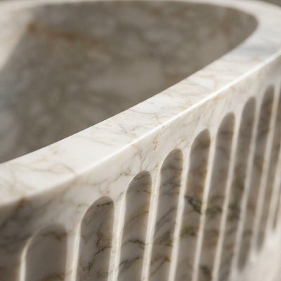 Calacatta Gold Fluted Honed Marble Bathtub — marble detail