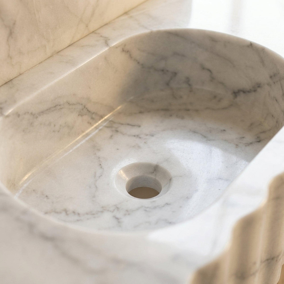 Custom Carrara Floating Marble Basin with Backsplash and Hand Carved Detail, Small Batch Artisan Production — view 14